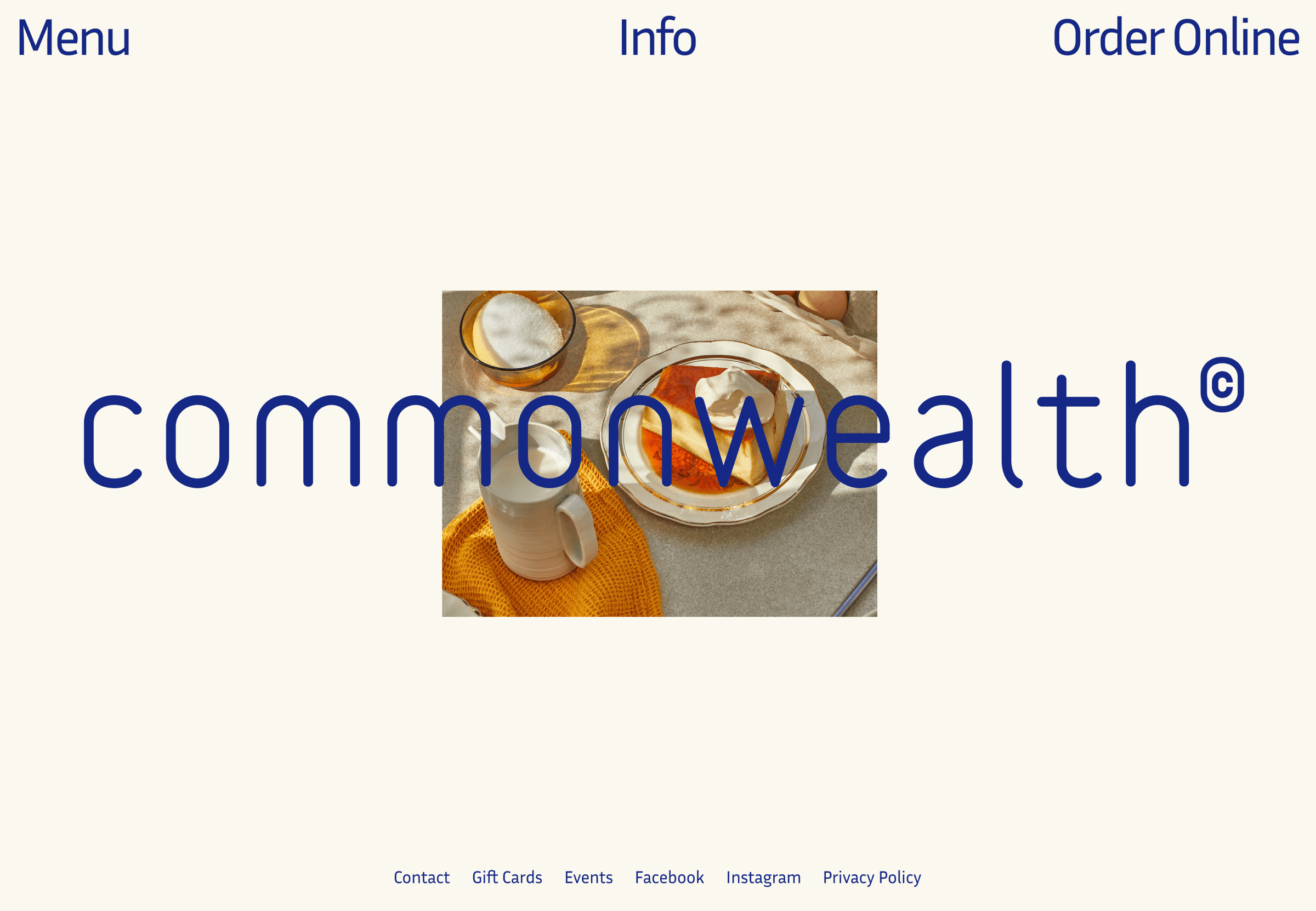 Commonwealth homepage with a blue wordmark over a breakfast photo